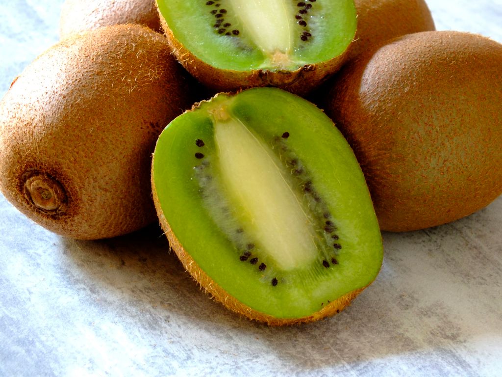 kiwi arranged on a counter